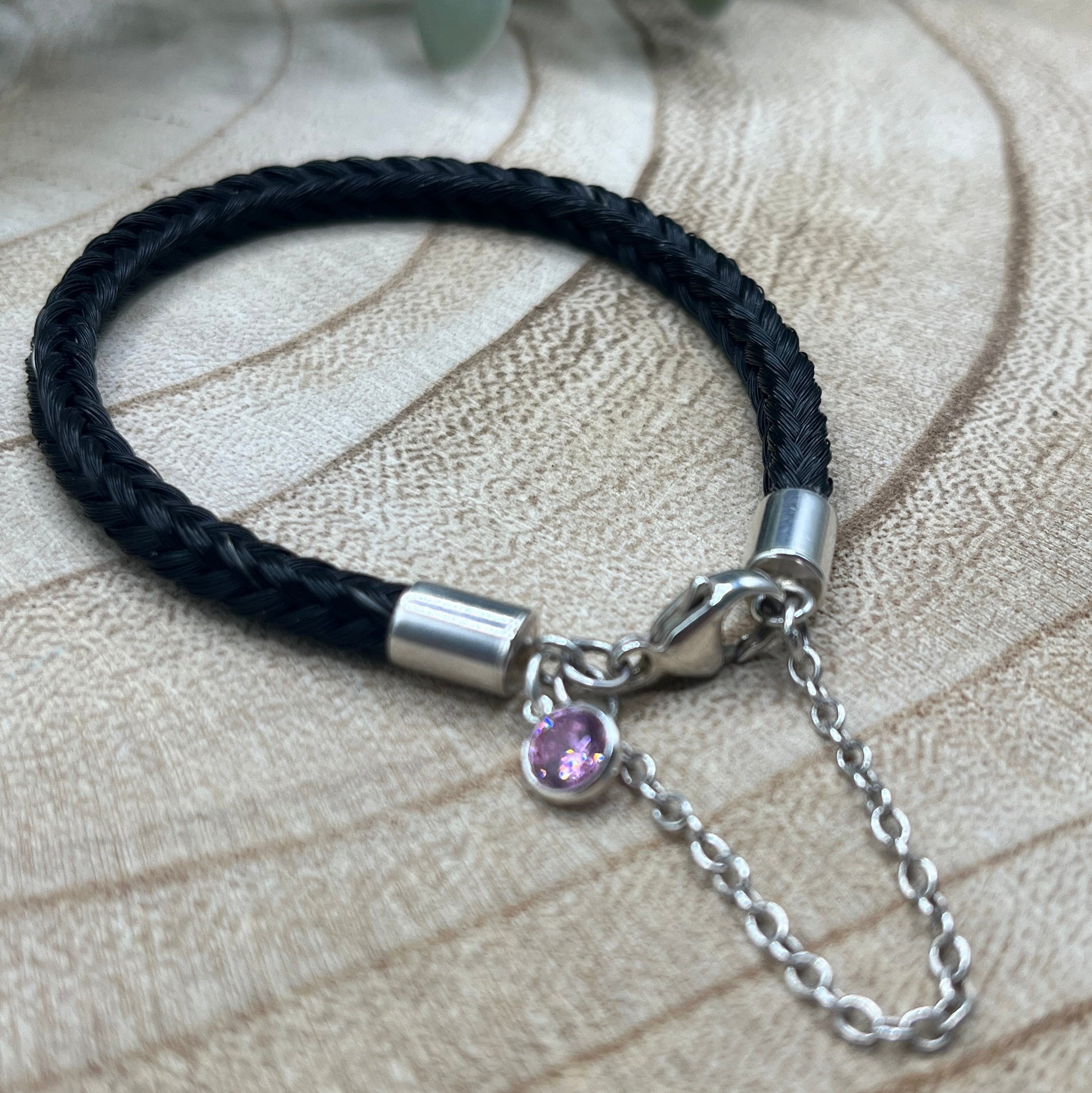 Trigger clasp horsehair bracelet handcrafted from tail hair with pink charm