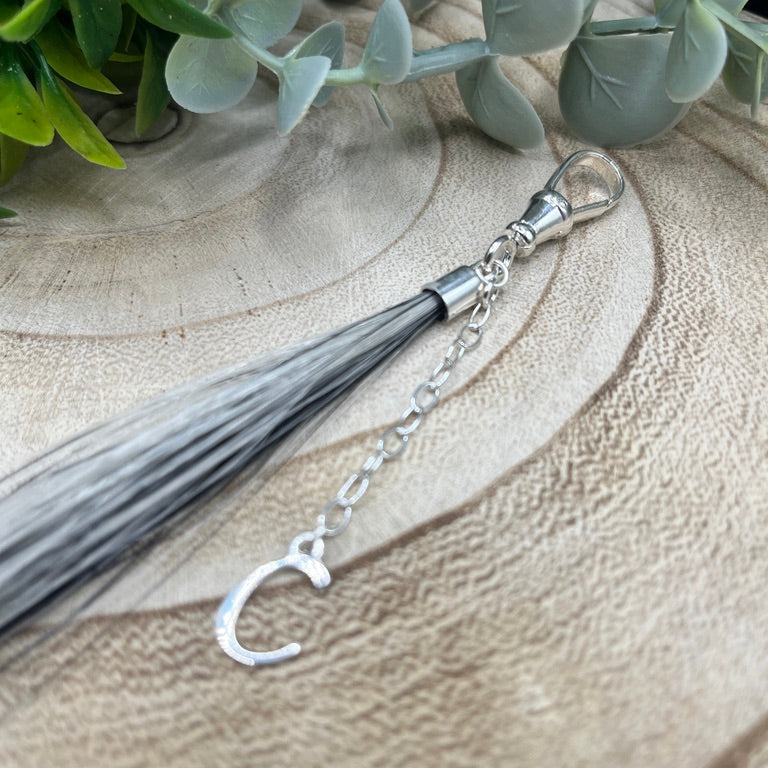 Custom horsehair tassel keepsake made from loose tail or mane hair with sterling silver fittings