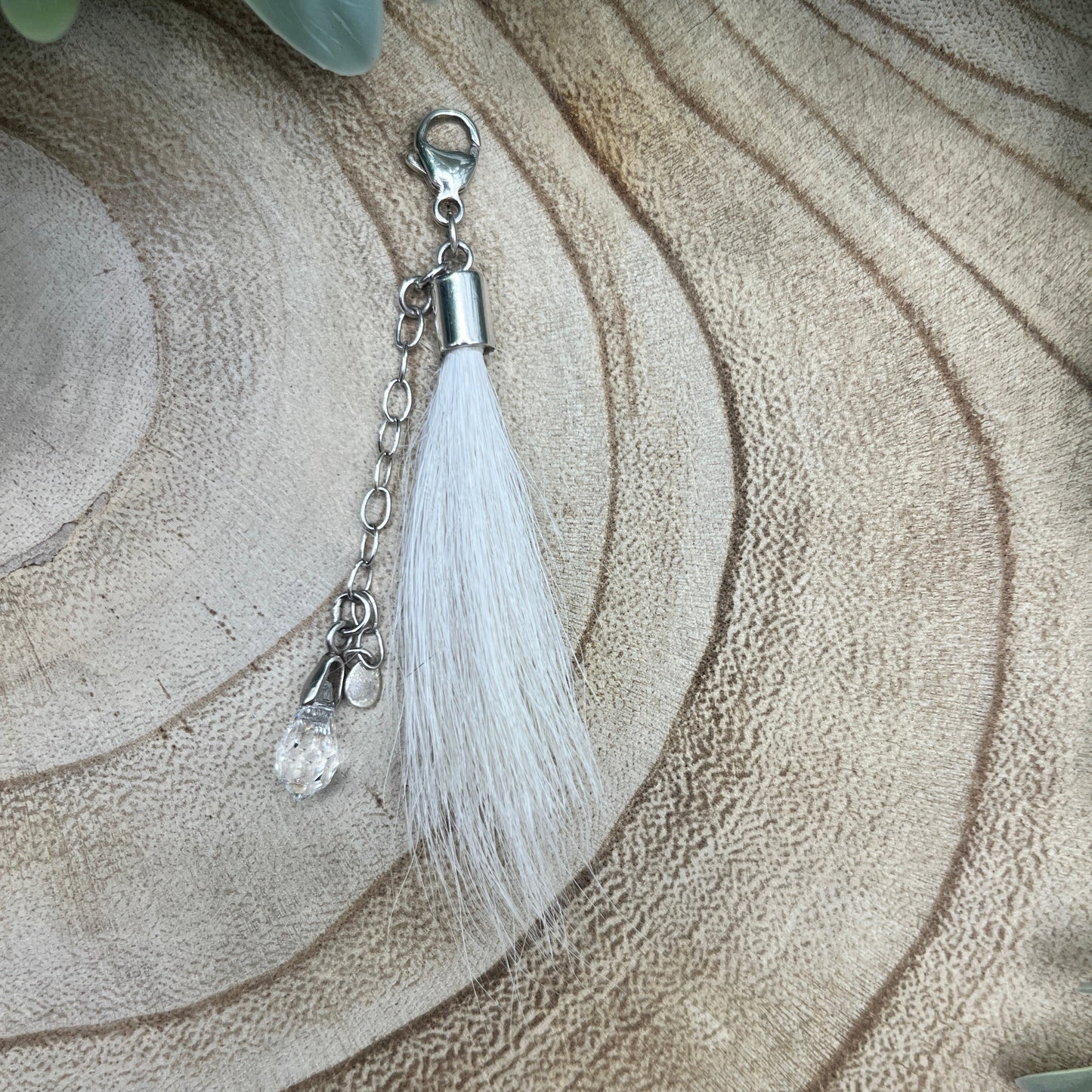 Donkey hair tassel keepsake with polished sterling silver cap, hand-strung from tail or mane