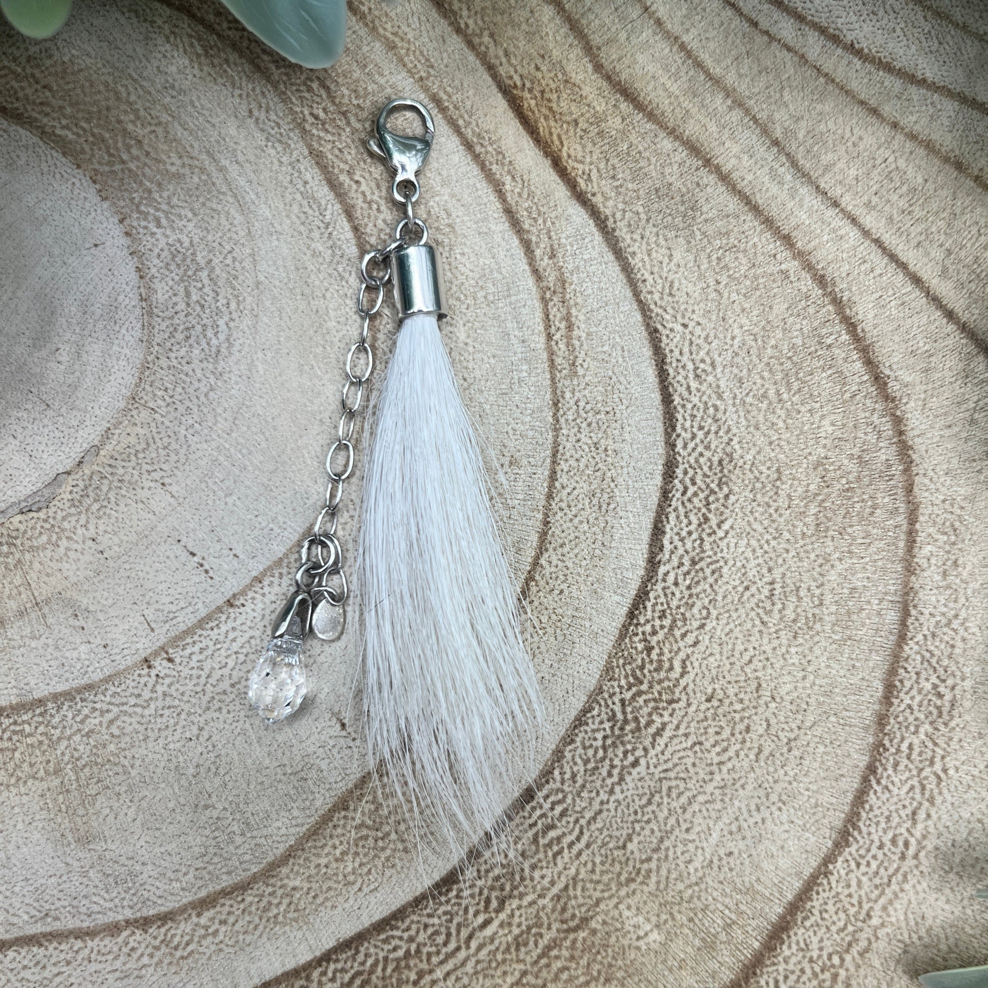 Donkey hair tassel keepsake with polished sterling silver cap, hand-strung from tail or mane