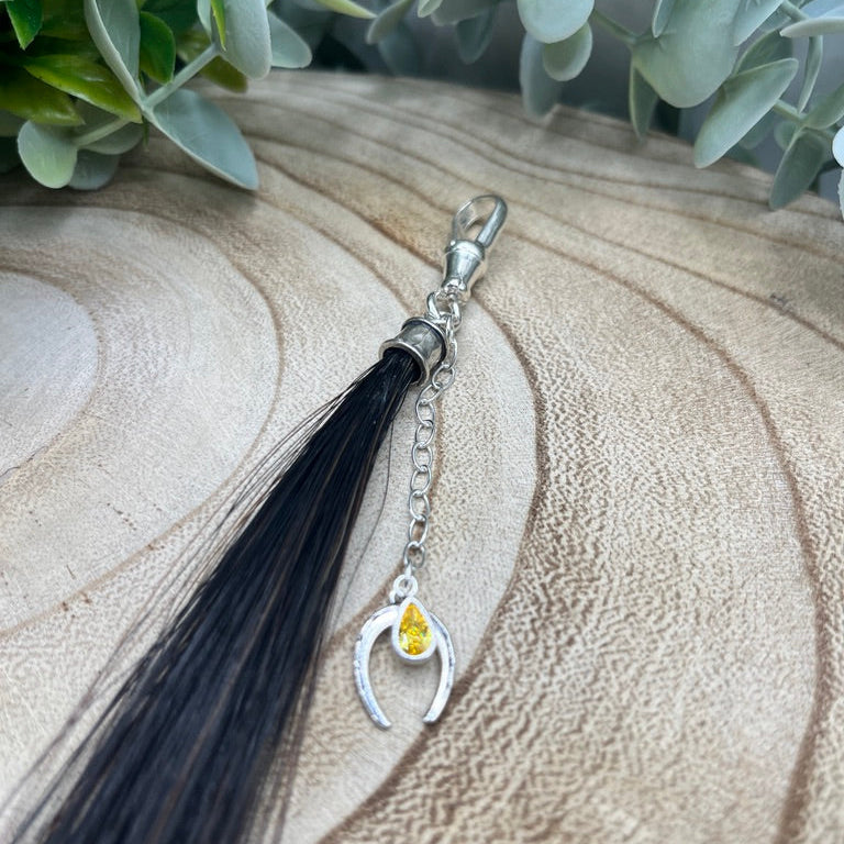 Custom horsehair tassel keepsake made from loose tail or mane hair with sterling silver fittings