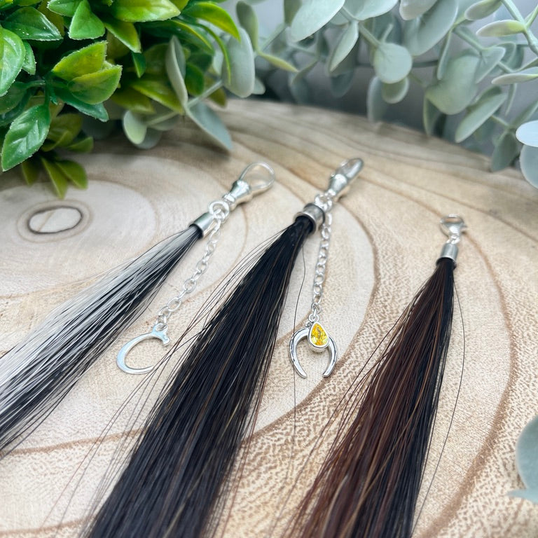 Loose horsehair tassel keepsake with optional sterling silver charms for personalisation